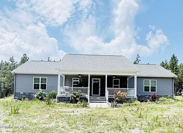 12.5 Acres of Land with Home for Sale in Carthage, North Carolina