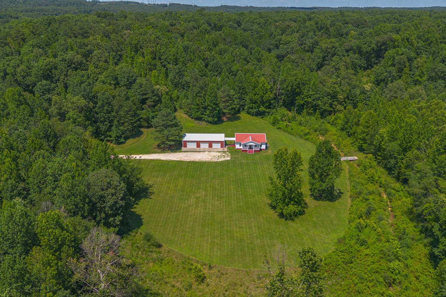 28.4 Acres of Recreational Land with Home for Sale in New Johnsonville, Tennessee