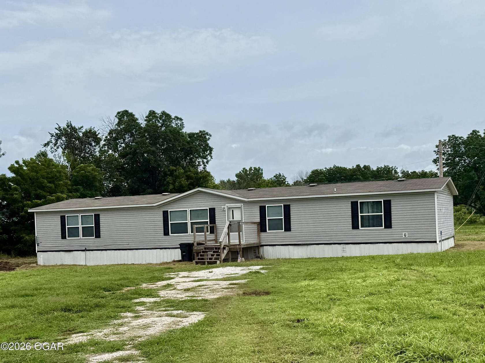 1.5 Acres of Land with Home for Sale in Stark City, Missouri