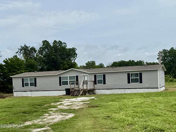 1.5 Acres of Land with Home for Sale in Stark City, Missouri