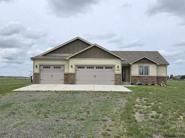 5 Acres of Land with Home for Sale in Cheyenne, Wyoming