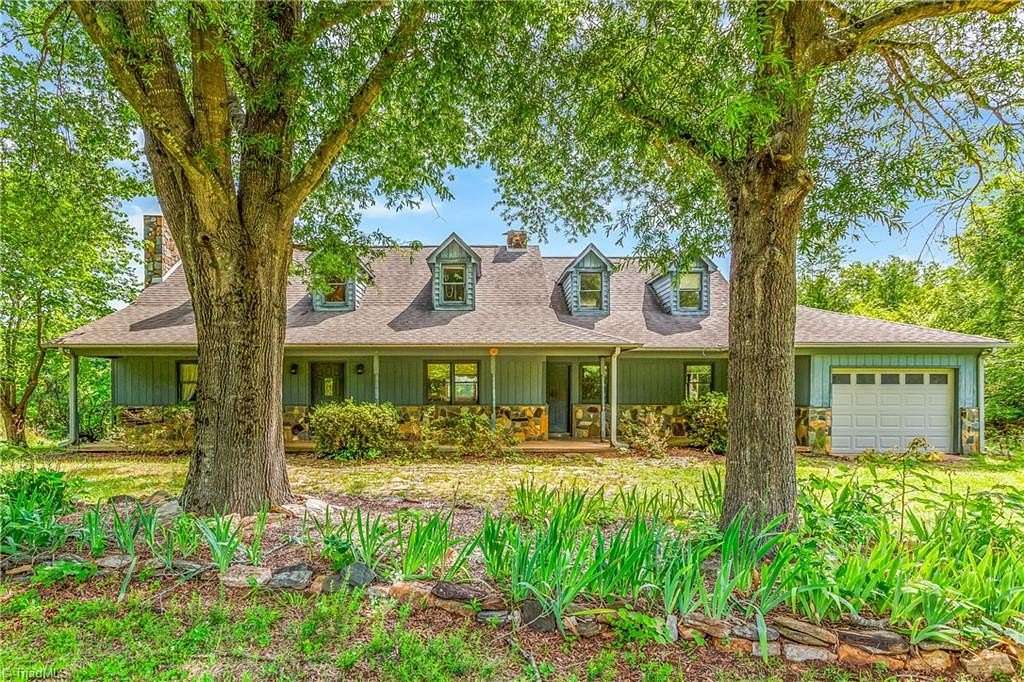 22 Acres of Agricultural Land with Home for Sale in East Bend, North Carolina