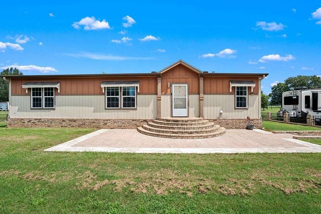 7.36 Acres of Land with Home for Sale in Palestine, Texas