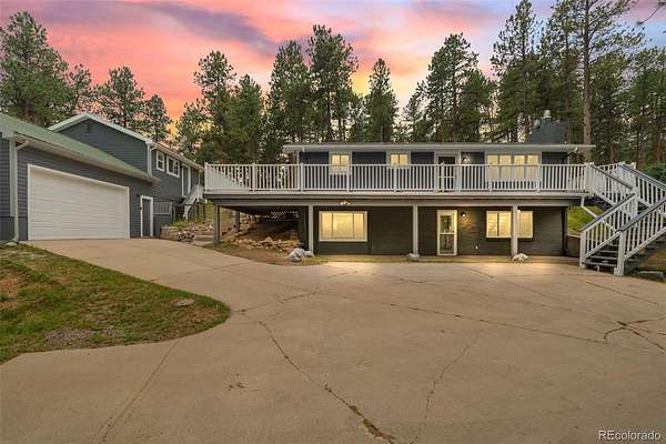 1.5 Acres of Land with Home for Sale in Evergreen, Colorado