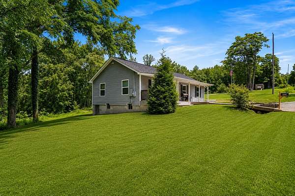5.82 Acres of Land with Home for Sale in Whites Creek, Tennessee