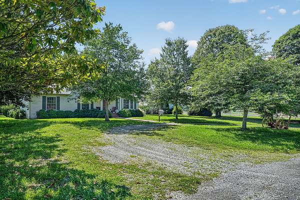 67.8 Acres of Land with Home for Auction in McMinnville, Tennessee