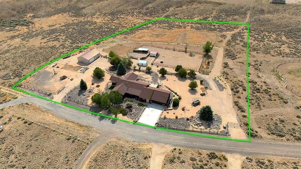 5 Acres of Land with Home for Sale in Cody, Wyoming