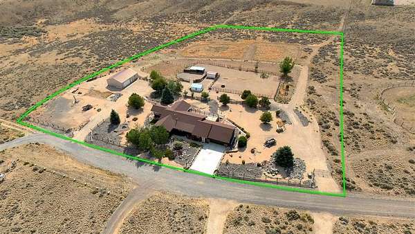 5 Acres of Land with Home for Sale in Cody, Wyoming