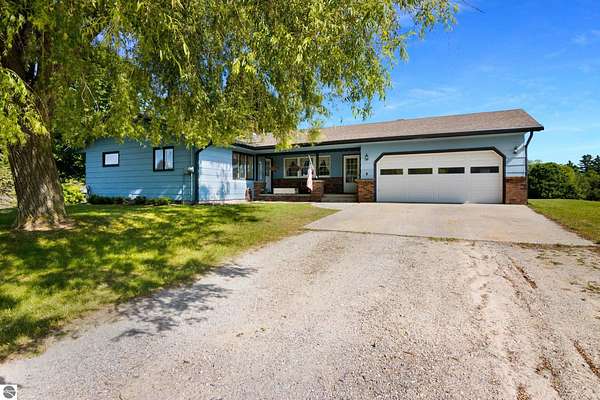 10 Acres of Land with Home for Sale in Maple City, Michigan