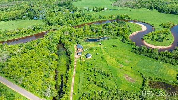110 Acres of Land with Home for Sale in Baraga, Michigan