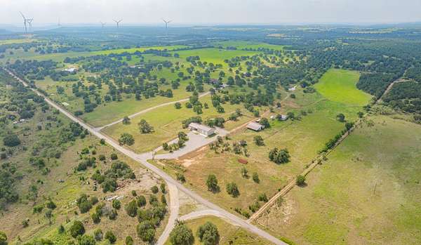 165 Acres of Land with Home for Sale in Ranger, Texas