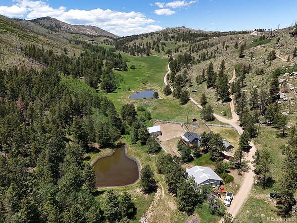 80 Acres of Land with Home for Sale in Bellvue, Colorado