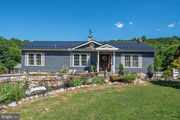 1.63 Acres of Land with Home for Sale in Elliottsburg, Pennsylvania
