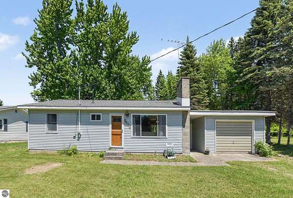 3.55 Acres of Land with Home for Sale in Rapid City, Michigan