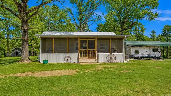 3.5 Acres of Land with Home for Sale in Strawberry, Arkansas