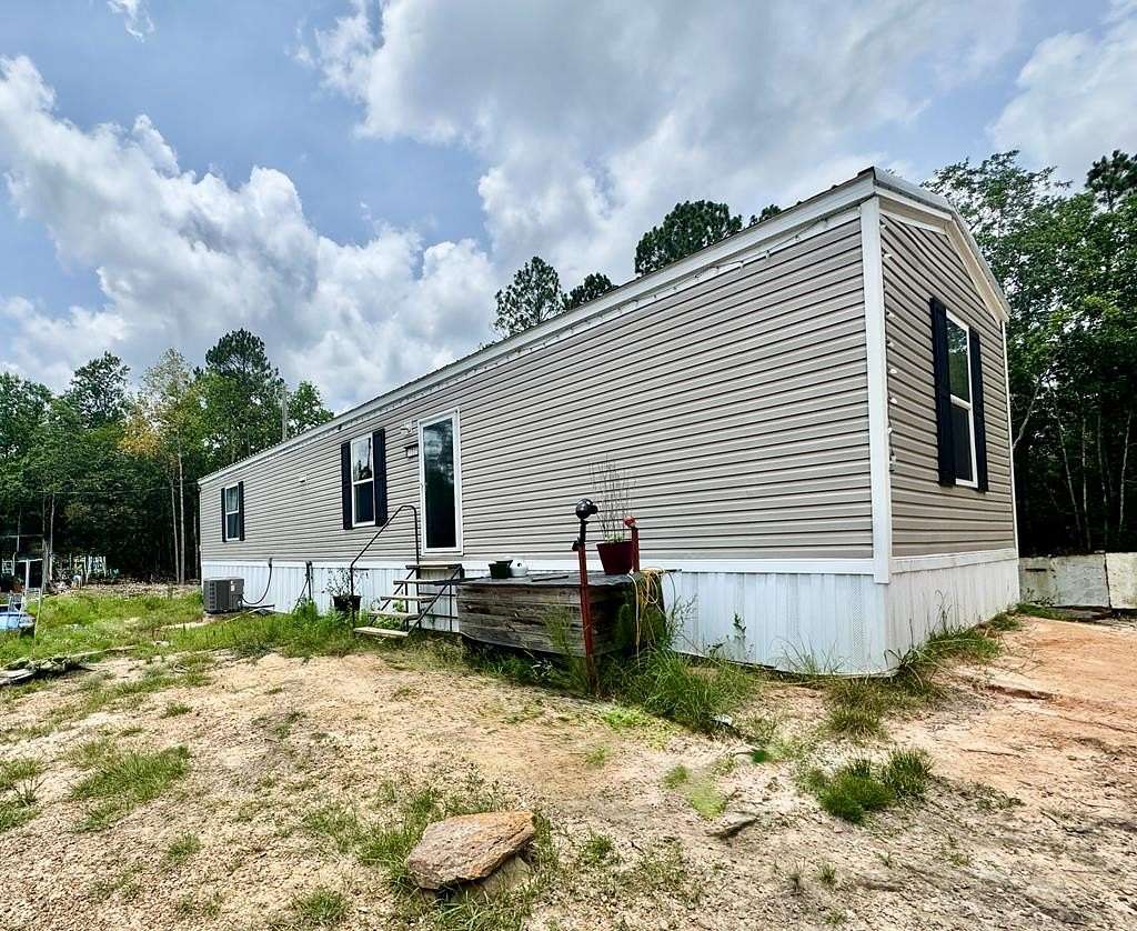 6.8 Acres of Land with Home for Sale in Perkinston, Mississippi