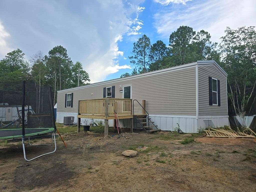6.8 Acres of Land with Home for Sale in Perkinston, Mississippi