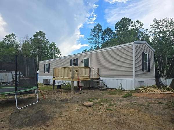 6.8 Acres of Land with Home for Sale in Perkinston, Mississippi