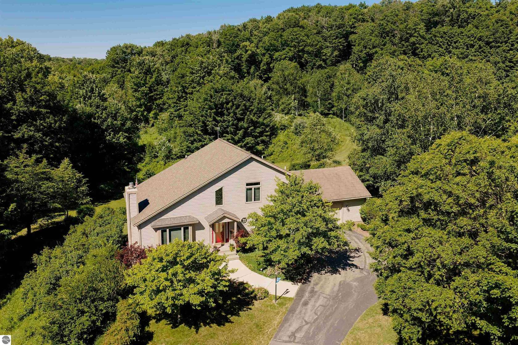 10.3 Acres of Recreational Land with Home for Sale in Traverse City, Michigan