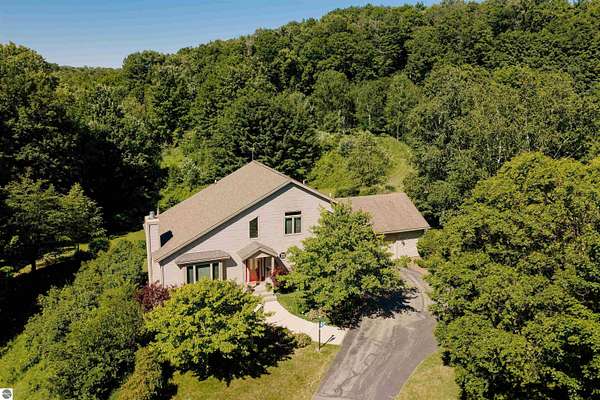 10.3 Acres of Recreational Land with Home for Sale in Traverse City, Michigan