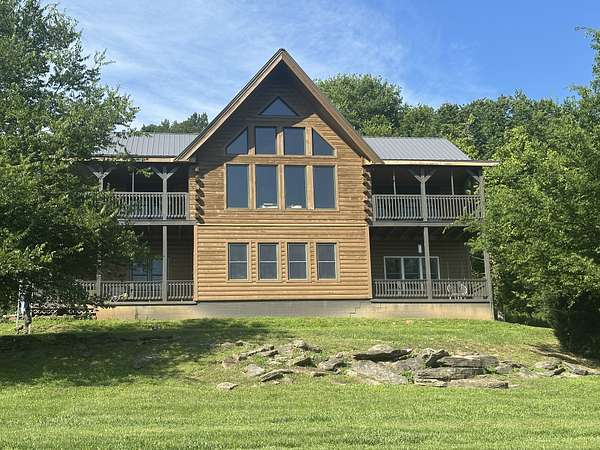 56.3 Acres of Recreational Land with Home for Sale in Pleasant Shade, Tennessee