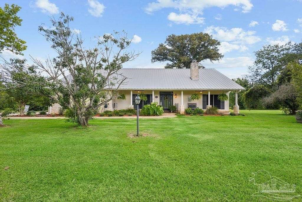 10 Acres of Recreational Land with Home for Sale in Jay, Florida