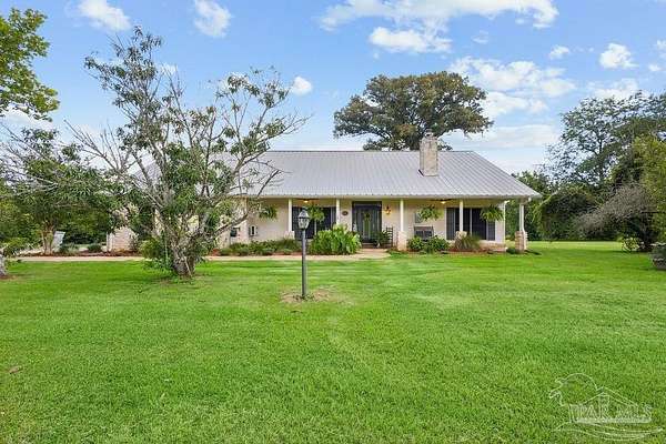 10 Acres of Recreational Land with Home for Sale in Jay, Florida