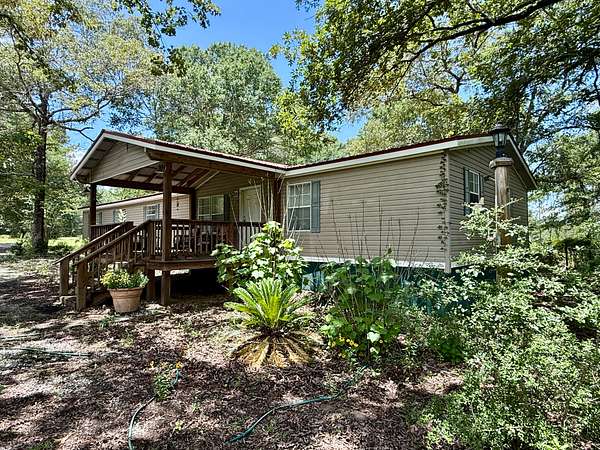 5.5 Acres of Land with Home for Sale in Kinston, Alabama