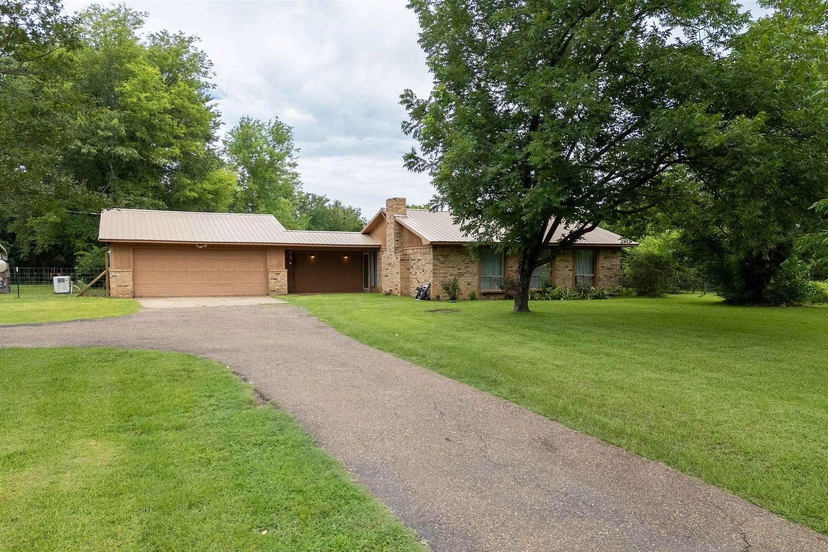 29.8 Acres of Land with Home for Sale in Ore City, Texas