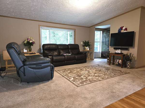 11.4 Acres of Land with Home for Sale in Stark City, Missouri