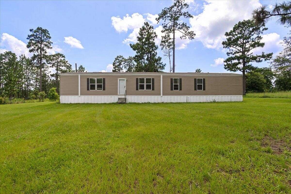 5 Acres of Land with Home for Sale in Purvis, Mississippi