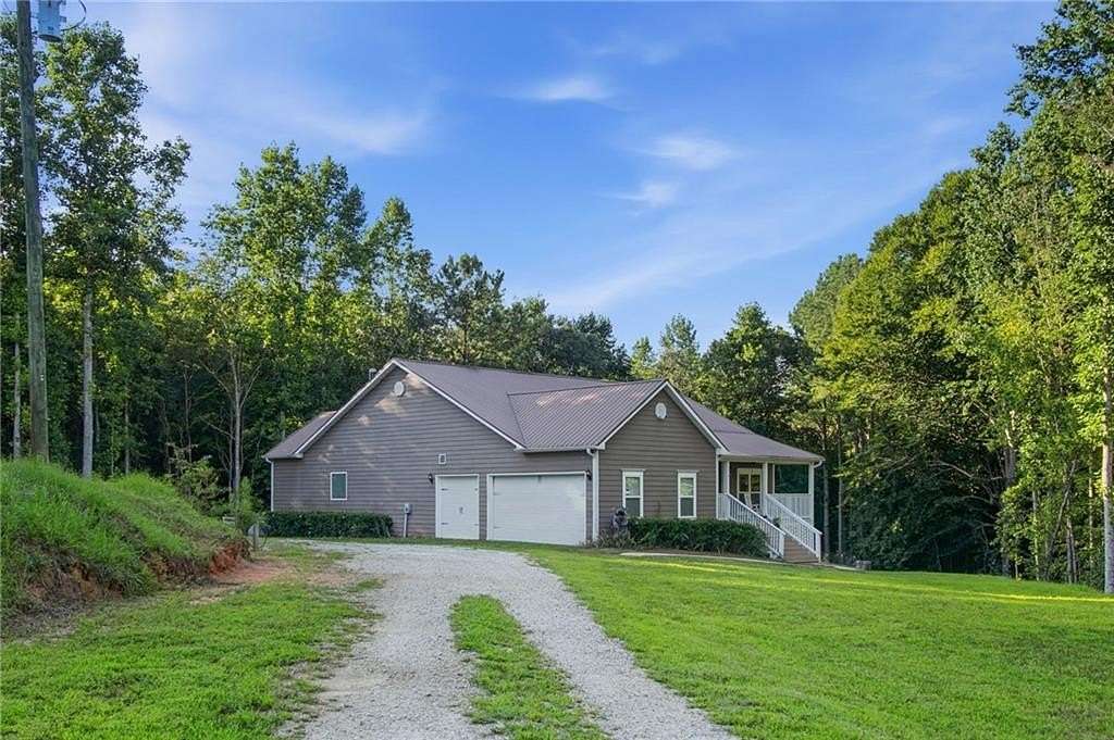 7.33 Acres of Land with Home for Sale in Dawsonville, Georgia