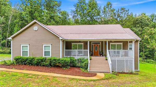 7.33 Acres of Land with Home for Sale in Dawsonville, Georgia