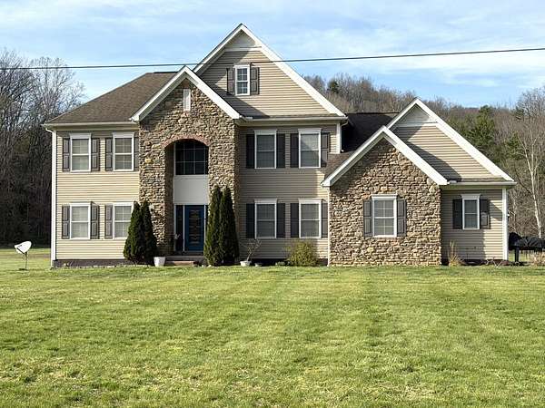3.56 Acres of Land with Home for Sale in Greenup, Kentucky