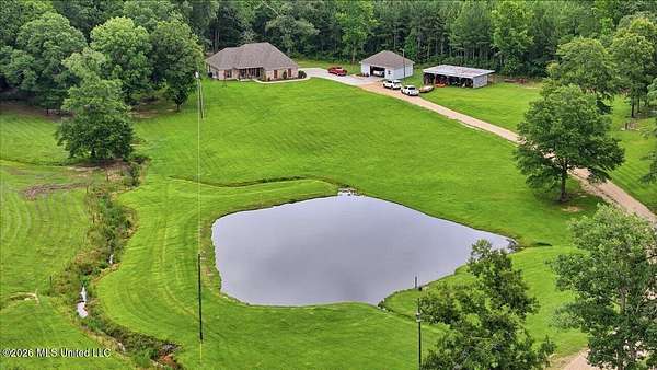9.1 Acres of Land with Home for Sale in Magee, Mississippi