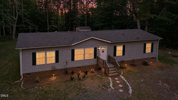 7.55 Acres of Land with Home for Sale in Hurdle Mills, North Carolina
