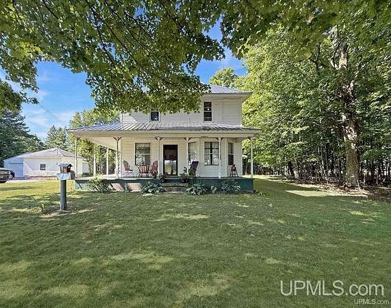5 Acres of Land with Home for Sale in Cooks, Michigan