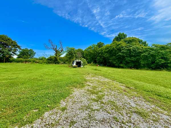 1.5 Acres of Land with Home for Sale in Loretto, Tennessee