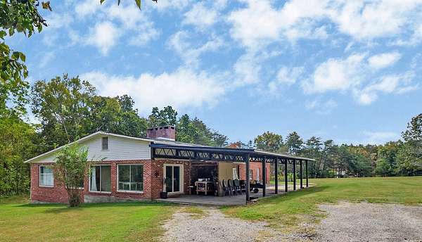 8.47 Acres of Land with Home for Sale in Dayton, Tennessee