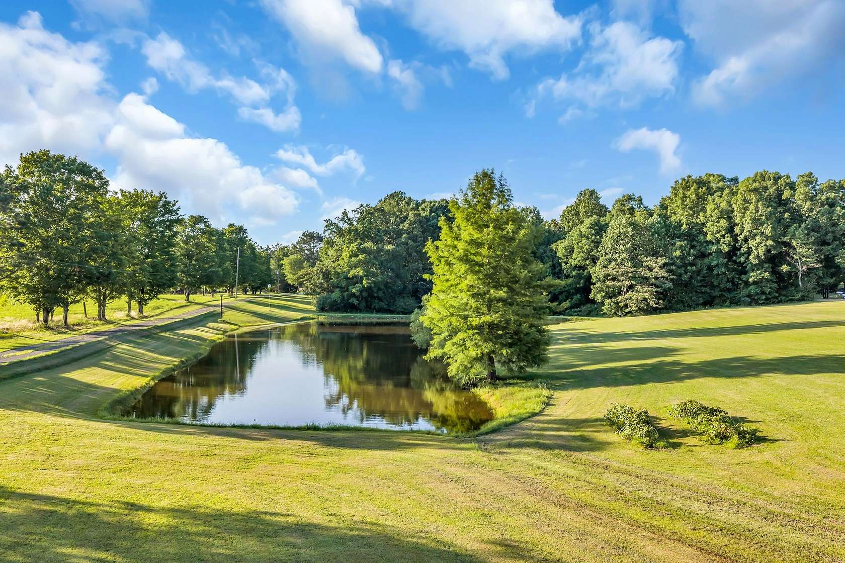 12.2 Acres of Land with Home for Sale in Bon Aqua, Tennessee