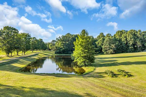 12.2 Acres of Land with Home for Sale in Bon Aqua, Tennessee