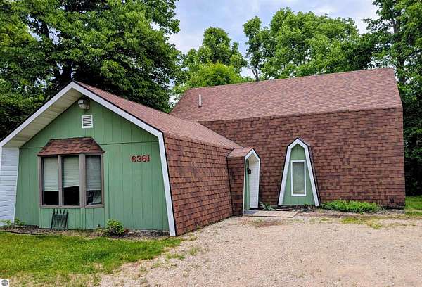 1.8 Acres of Land with Home for Sale in Mancelona, Michigan