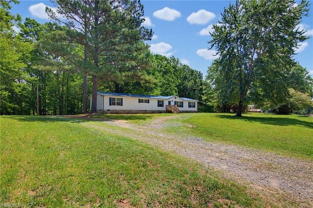 2 Acres of Land with Home for Sale in Madison, North Carolina