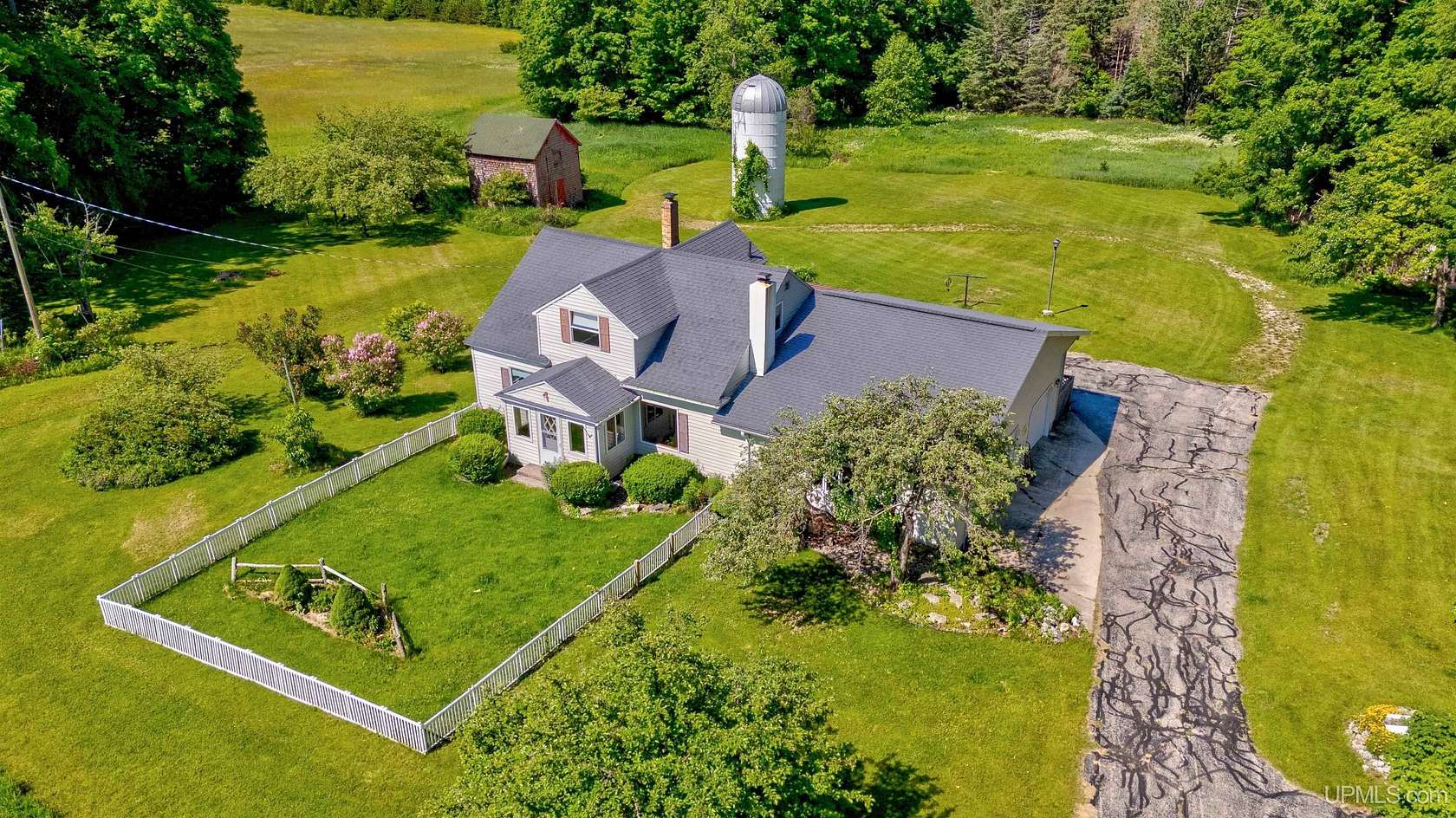 5 Acres of Land with Home for Sale in Cooks, Michigan