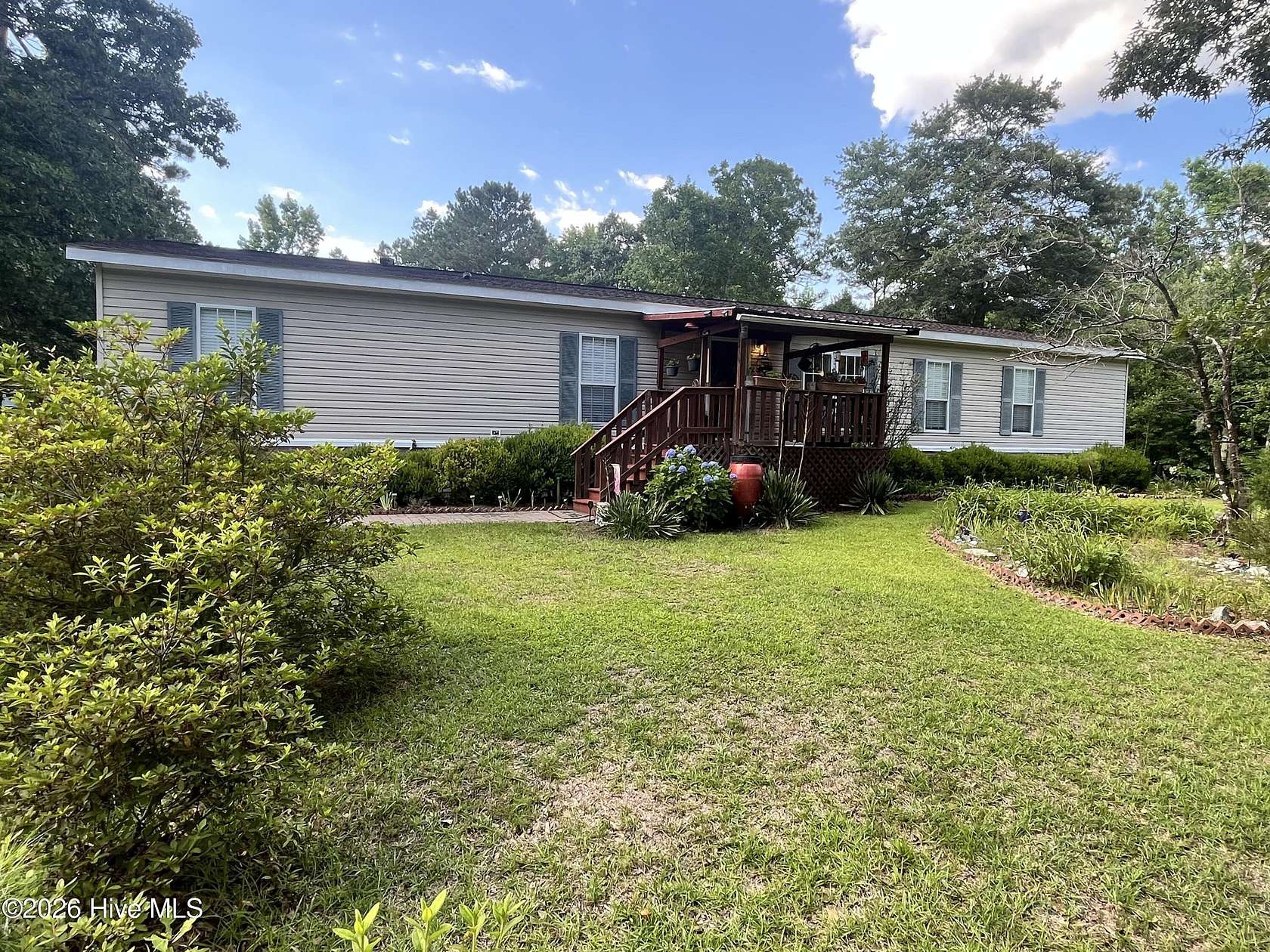 13 Acres of Recreational Land with Home for Sale in Whiteville, North Carolina