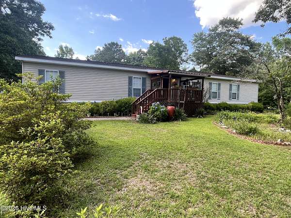 13 Acres of Recreational Land with Home for Sale in Whiteville, North Carolina