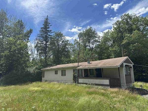 8 Acres of Land with Home for Sale in Winchester, New Hampshire