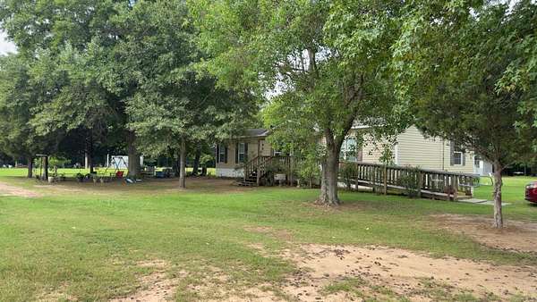 3.54 Acres of Land with Home for Sale in Dumas, Arkansas