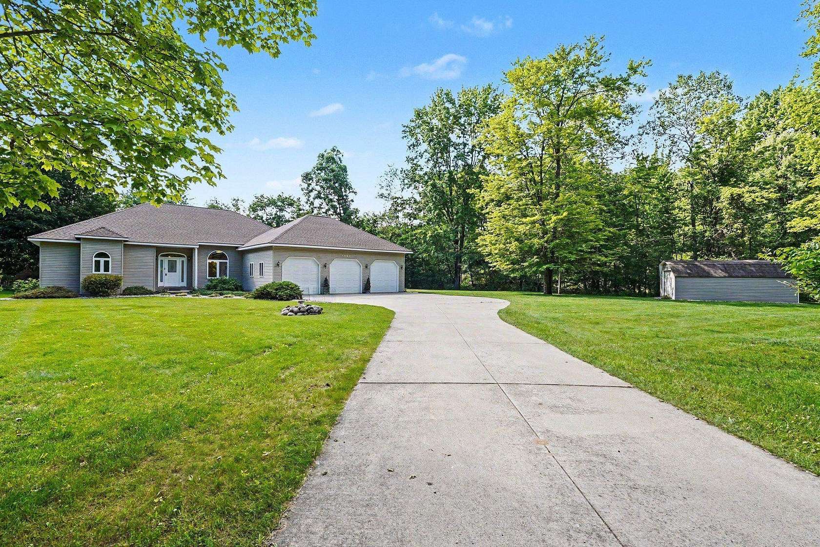 10.6 Acres of Recreational Land with Home for Sale in Beaverton, Michigan