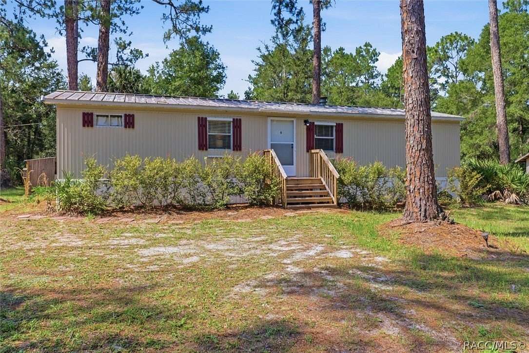 2.13 Acres of Land with Home for Sale in Inglis, Florida